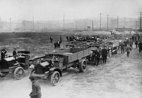 Automobiles and trucks, probably requisitioned for the war effort in Russia during World War I