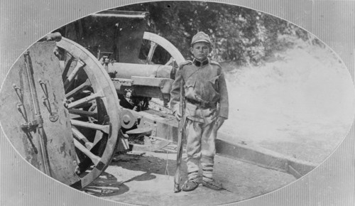 Serbian child soldier in uniform during World War I ca. 1914-1915