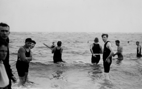 Men playing water baseball ca. 1914