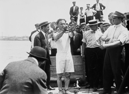 Photo of Harry Houdini in chains ca. 1910-1925