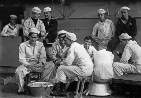 Sailors peeling potatoes on the U.S.S. Arkansas (BB-33) ca. 1910-1915