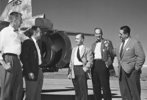 Seth B. ANDERSON AND NACA AMES PILOT Gorge E. COOPER WITH W.E. RHOADES, ROBERT McIVER, MICHAEL CASSENLY OF UNITED AIRLINES. Visit Ames to dicuss Thrust Reverser Problems. ca. 1957