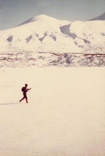 March 1976 - Ski touring on the frozen snow covered surface of Kulik Lake, Katmai National Monument, Alaska