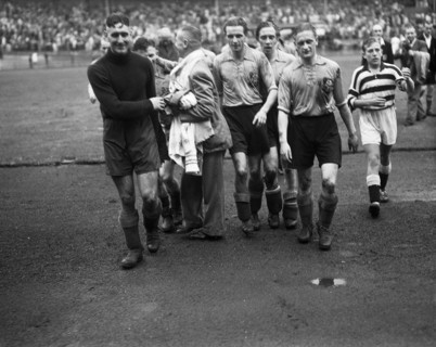 September 21, 1947 - Soccer players leaving the field after a match