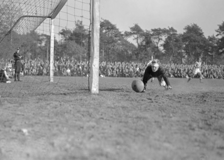 1940s Men's Soccer Match - AGOVV goalie is lucky with ball against post on October 10, 1947