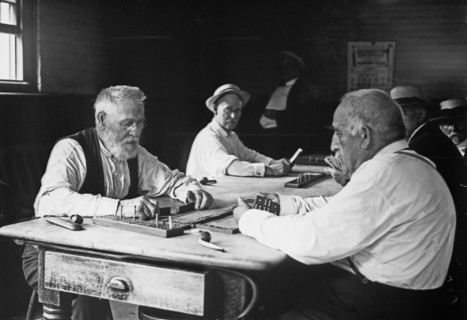 Old men playing cribbage -- Sailors' Snug Harbor ca. 1910-1915