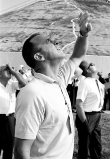 (12 Sept. 1966) Astronaut Alan B. Shepard Jr., Chief, MSC Astronaut Office, shields his eyes from the sun as he follows the Gemini-11 liftoff.