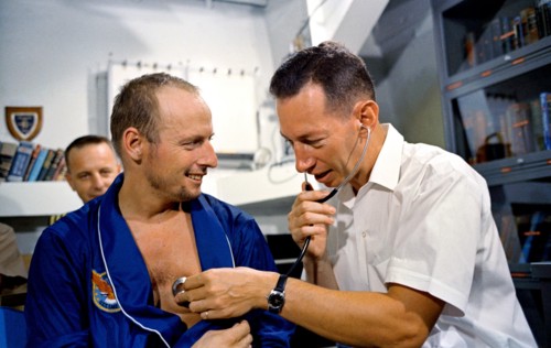 (29 Aug. 1965) Astronaut Charles Conrad Jr. has his heart rate checked by a physician after the Gemini-5 mission.
