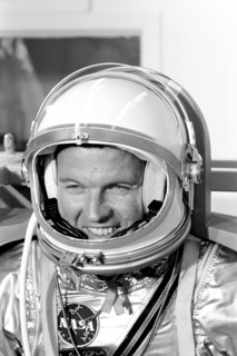 (1963) Astronaut L. Gordon Cooper Jr., prime pilot for the Mercury-Atlas 9 (MA-9) mission, relaxes while waiting for weight and balance tests to begin.