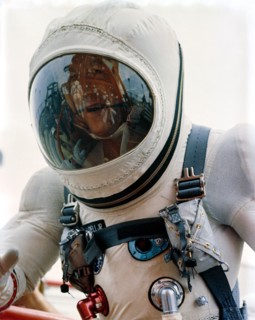 (4 Dec. 1965) Astronaut James A. Lovell Jr., pilot of the Gemini-7 spacecraft, walks up the ramp at Pad 19 during the Gemini-7 prelaunch countdown.