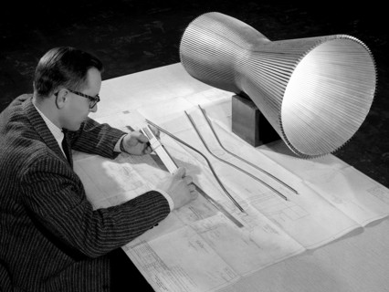 NASA Engineer Examines the Design of a Regeneratively-Cooled Rocket Engine ca. 1958