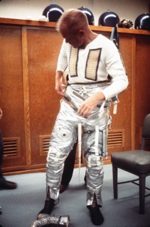 (20 Feb. 1962) Astronaut John H. Glenn Jr. dons spacesuit during preflight operations at Cape Canaveral, Feb. 20, 1962, the day he flew his Mercury-Atlas 6 spacecraft, Friendship 7, into orbital fligh...