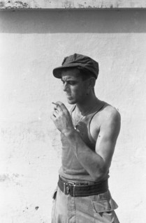 A soldier smokes a cigarette; Date November 1946; Location Batavia, Indonesia, Jakarta, Dutch East Indies