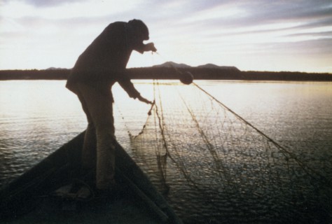 Fishing for whitefish along Kobuk River near the village of Ambler ca. 1973-1975