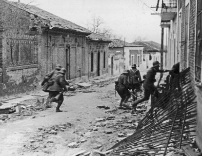 Nationalist soldiers raiding a suburb of Madrid during the Spanish Civil War ca. 1937