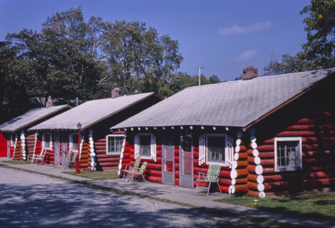 1980s United States -  Tawas Inn cabins diagonal view Route 23 East Tawas Michigan ca. 1988