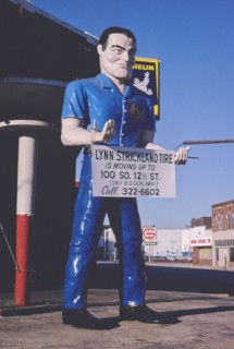 1980s United States -  Tire Man statue, 2nd Avenue South and 21st Street South, Birmingham, Alabama 1980