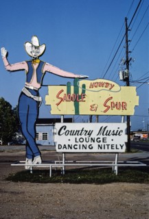 1980s America -  Saddle and Spur Lounge sign, Monroe, Louisiana 1982