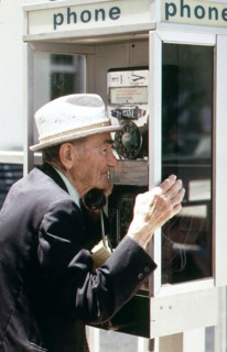 Member of the Retirement Community of South Beach using a pay telephone ca. 1975