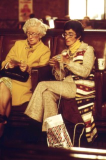 Amtrak train passengers pass the time before boarding at the Los Angeles Union Passenger Terminal, May 1974.