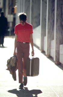 On a street in downtown Omaha, May 1973 young man lonely