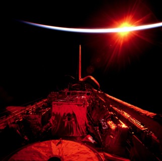 Views of the empty payload bay during sunrise