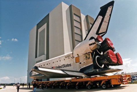 Space Shuttle Columbia rolls over from Orbiter Processing Facility bay 1 to the Vehicle Assembly Building to be mated to its external tank/solid rocket booster stack ca. 1997