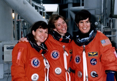 STS-83 Alternate Mission Specialist Catherine "Cady" Coleman, Pilot Susan L. Still and Payload Commander Janice Voss mug for the camera at the 195-foot level of Launch Pad 39A during Terminal Countdow...