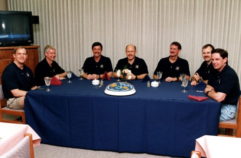 As part of the final STS-82 prelaunch activities, the seven crew members gather for lunch and a photo opportunity in the Operations and Checkout Building ca. 1997