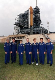 STS-84 crew members pose for a group photograph at Launch Pad 39A ca. 1997