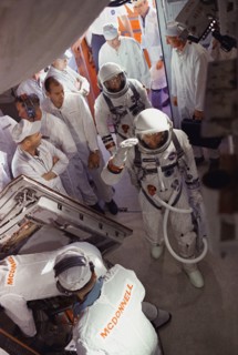 (21 Aug. 1965) --- Astronauts L. Gordon Cooper Jr. (foreground) and Charles Conrad Jr. arrive in the white room at Pad 19 during the Gemini-5 countdown at Cape Kennedy, Florida