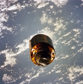 1992 - The 4.5 ton satellite was successfully snared by three astronauts on a third EVA. The three hand-grabbed the errant satellite, pulled it into the cargo bay, and attached a boost-given perigee s...