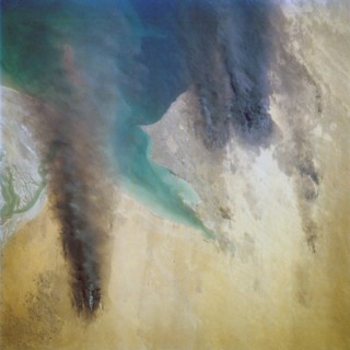 (28 April-6 May 1991) --- Kuwait Oil Fires - This view from the Earth-orbiting Space Shuttle Discovery shows the smoke from burning oil well fires, aftermath of Iraqi occupation.