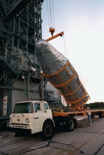 1998 - Arriving in the early morning hours at Pad 17A, Cape Canaveral Air Station, the fairing for Deep Space 1 is lifted from the truck before being raised to its place on the Boeing Delta 7326 rocke...