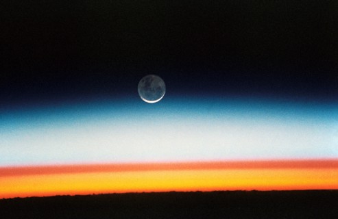 (22 Oct.-1 Nov. 1992) --- As the Space Shuttle Columbia orbited Earth in an easterly direction over the Indian Ocean, moonrise was followed quickly by sunrise.