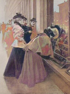 Women are standing in front of the window of a jeweler and are looking for Christmas wishes