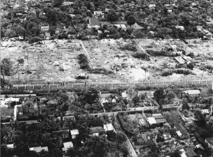 Aerial view showing houses being cleared away