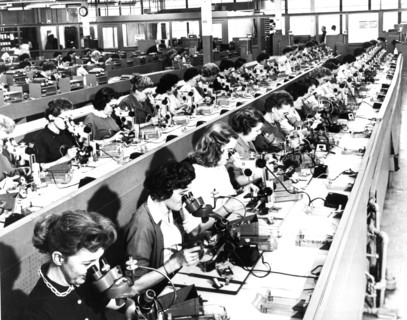 Long lines of factory workers