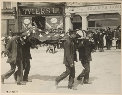 Carrying a body recovered from the sinking of the Lusitania