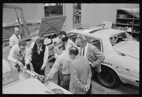 Working on Fairchild Hiller Safety Car