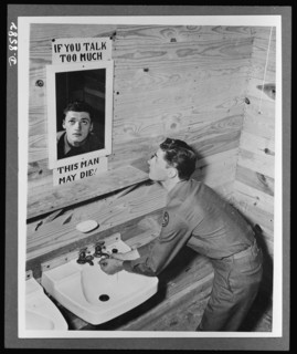 No Loose Talk poster in restroom