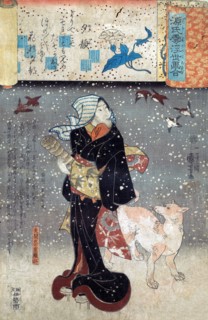 Woman and her dog during falling snow