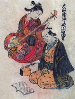 Young Lady taking a lesson on a Shamisen