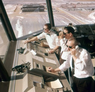 Air traffic controllers at work at Dulles Airport. Chantilly, VA, circa 1968.
