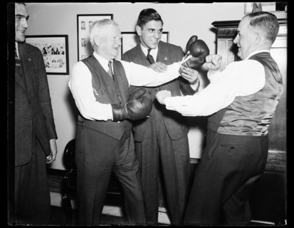 Franklin Roosevelt's Vice-President John Nance Garner playfully posing with boxing gloves. Washington, DC, March 25, 1936.