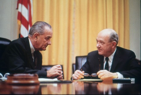 President Lyndon B. Johnson confers with Secretary of Defense Dean Rusk at the White House. Washington, DC, circa 1967.