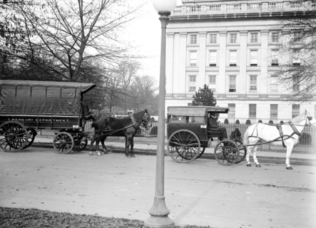 Horse drawn U.S. Treasury Department wagon in Washington D.C. ca. 1910-1917