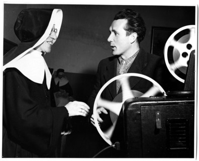 The School Teacher, in This Case a Nun, is as Keen as Her Pupils on Seeing the Films ca. 1948-1954