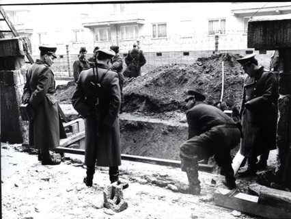 Because of A Water Line Burst Directly Under The Wall a Troup of Volksarmy Workers Are Called In.