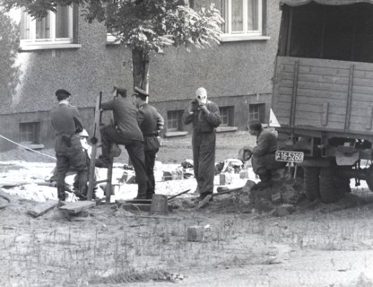 With A Massive Operation of High Pressure Water Cannons, Jeeps and Tanks, Soldiers from East Berlin
